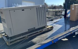 Long Island Power Systems: 5 Signs Your Backup Generator Needs Service in Long Island Homes & Businesses | 10 | Long Island Power Systems Generator loaded on flatbed truck for delivery and installation by Long Island Power Systems